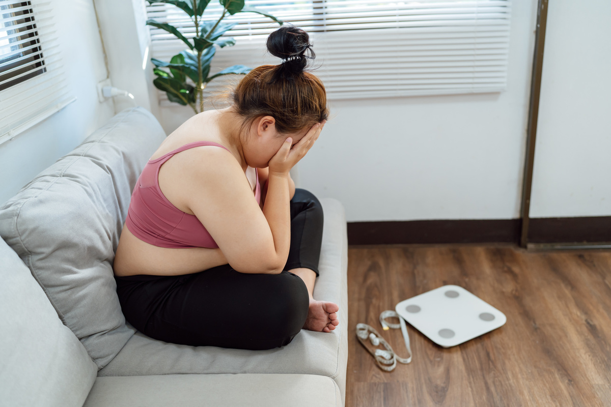 Over Sized Woman Body Weight Frustration Concept